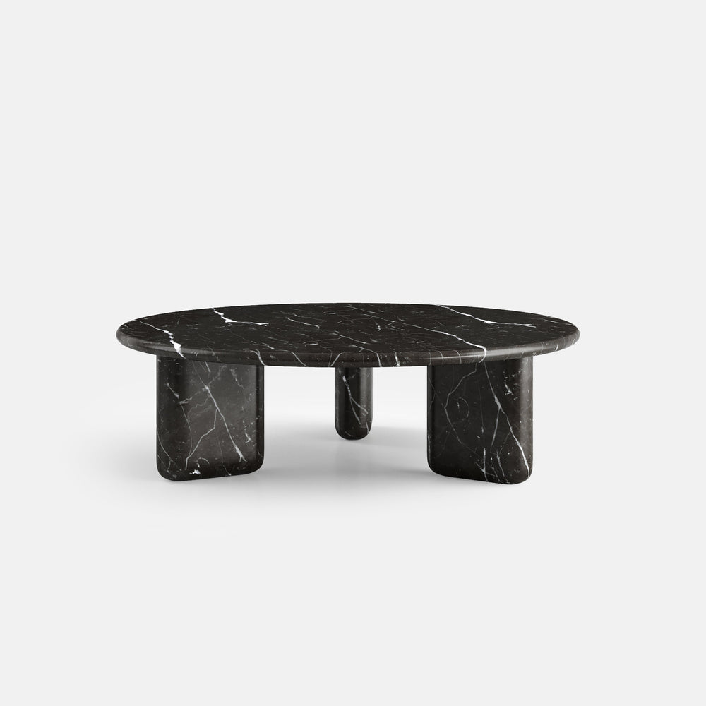 Table basse ronde en marbre noir veiné blanc