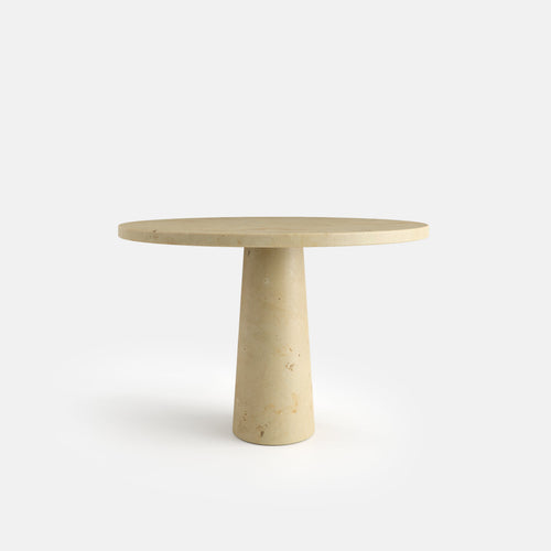 Table à manger ronde Axe sur piétement central conique, configuration photographiée en pierre calcaire Ataija Creme.