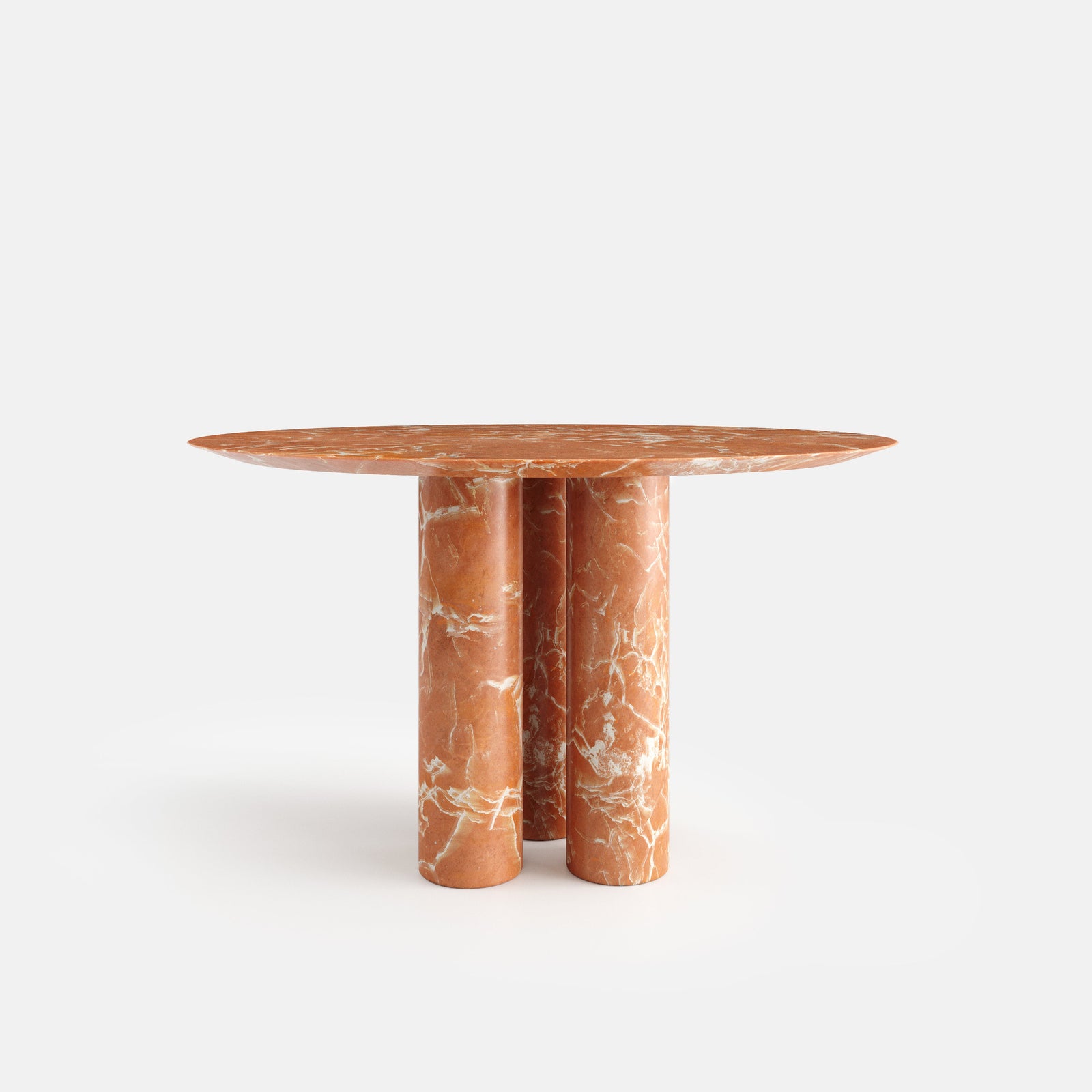Table à manger ronde Corolle sur trois pieds cylindriques, vue de face, configuration en marbre Rosso Alicante.