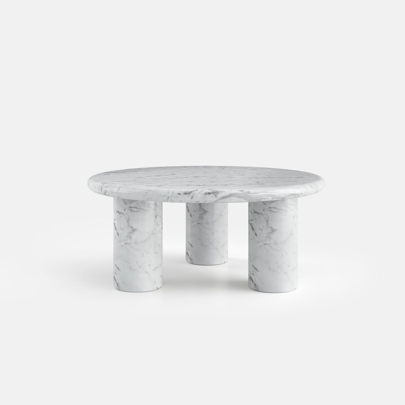 Table basse ronde Orbe sur trois pieds cylindriques, vue de face, configuration en marbre de Carrare.